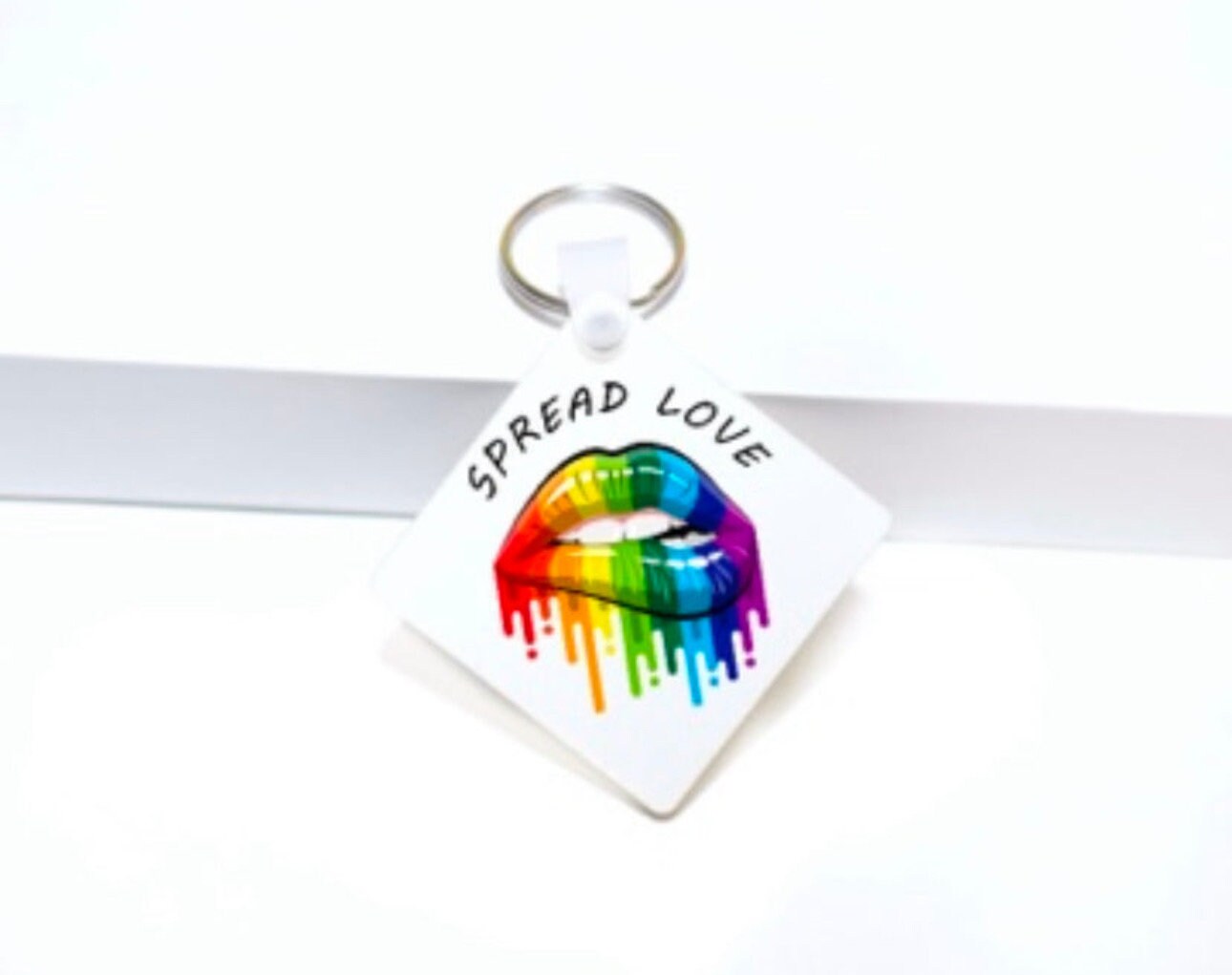 Spread love PRIDE keychain